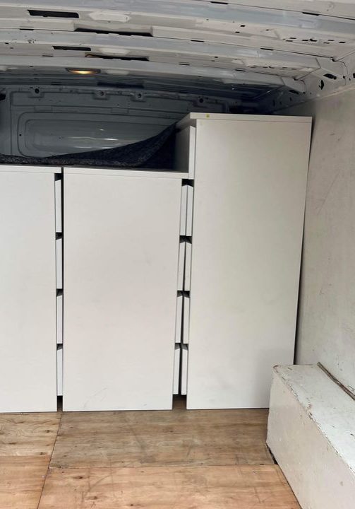 Home furnishings being carefully moved, illustrating the professional home removal services by Kidderminster Logistics Ltd